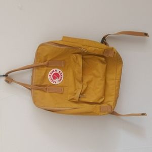 Ochre yellow Kanken backpack lightly used